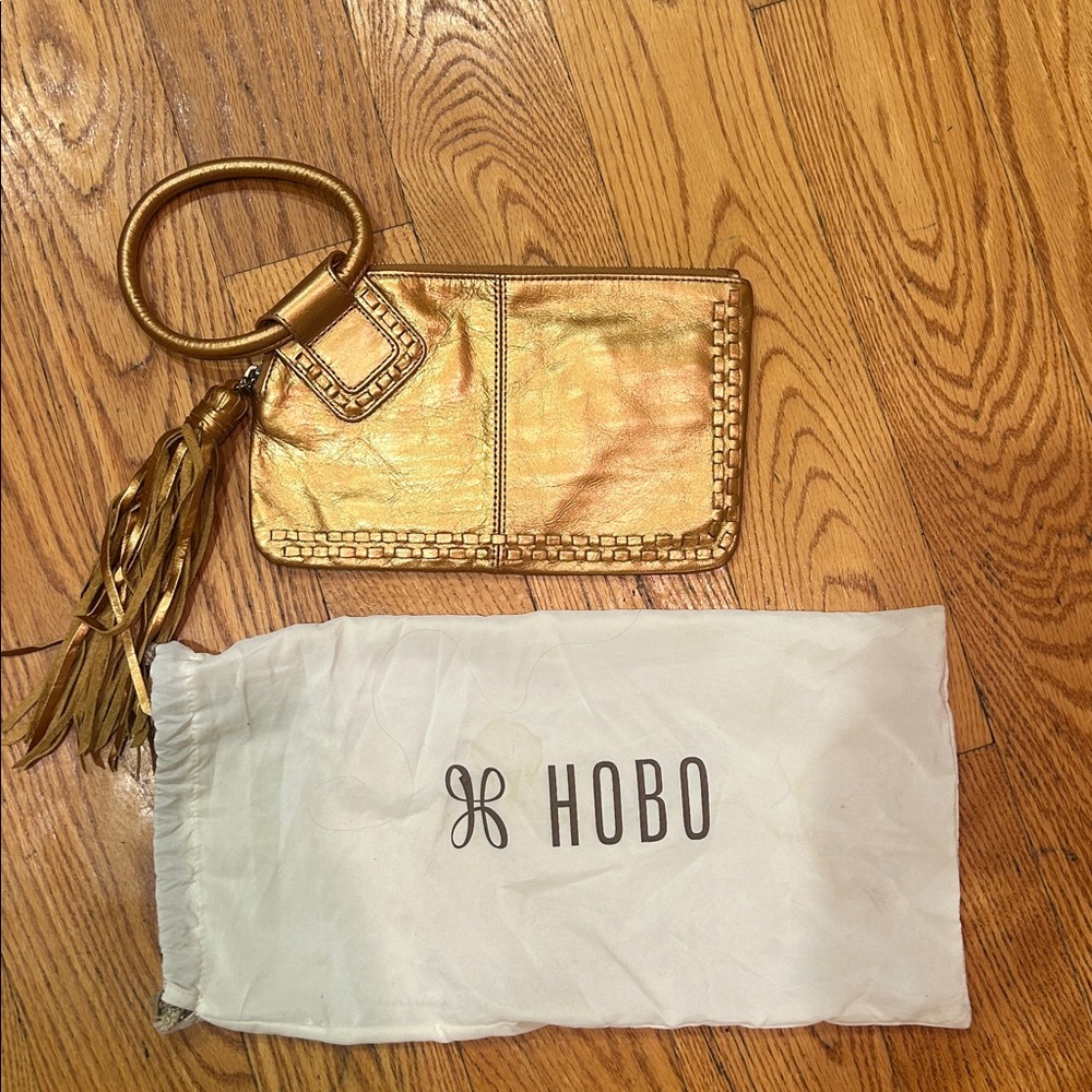 HOBO Metallic Gold Wristlet with Tassel